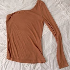 Reversible one sleeved top